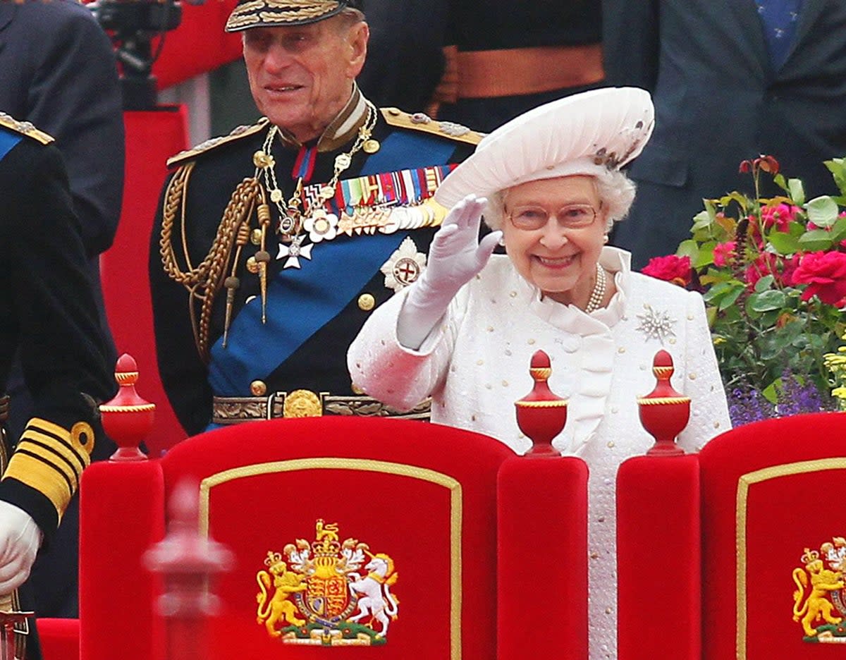 Queen Elizabeth II and Prince Philip, Duke of Edinburgh during the Diamond Jubilee Pageant in 2012 (PA)