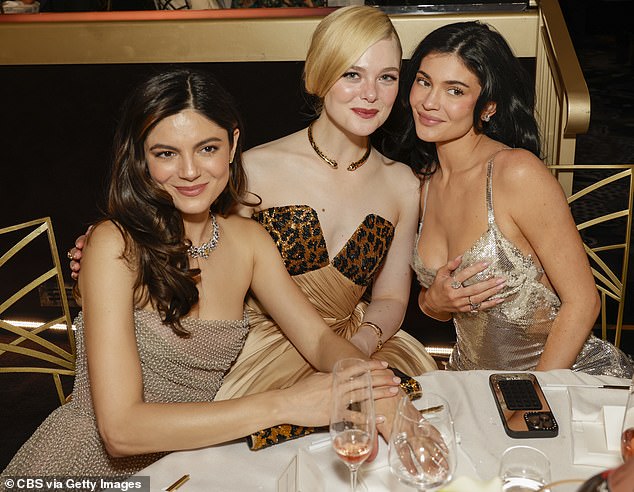 While at the event at The Beverly Hilton, the lip kit mogul could be seen mingling with Timothee's A Complete Unknown co-stars Monica Barbaro (left) and Elle Fanning (center)