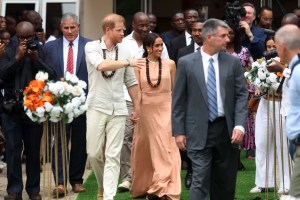 Prince Harry, Duke of Sussex and Meghan, Duchess of Sussex, arrive at the Lightway Academy on May 10 in Abuja, Nigeria.