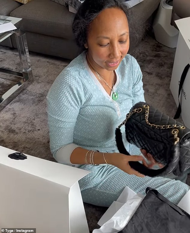 There were also videos of happier occasions, including one clip of Pasionaye unwrapping a 'beautiful' Chanel purse that Tyga had gotten her as a gift