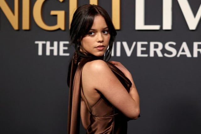Jenna Ortega Stuns in Gorgeous Deep V Dress at SNL Anniversary!