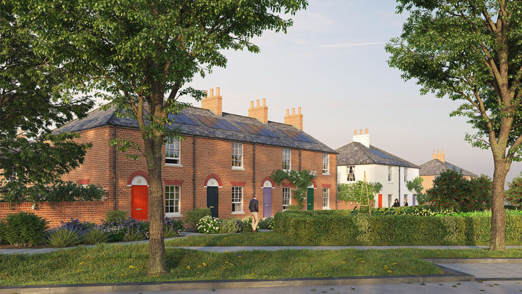 A view of a row of traditional houses overlooking a green in Faversham, a market town in Kent, England.