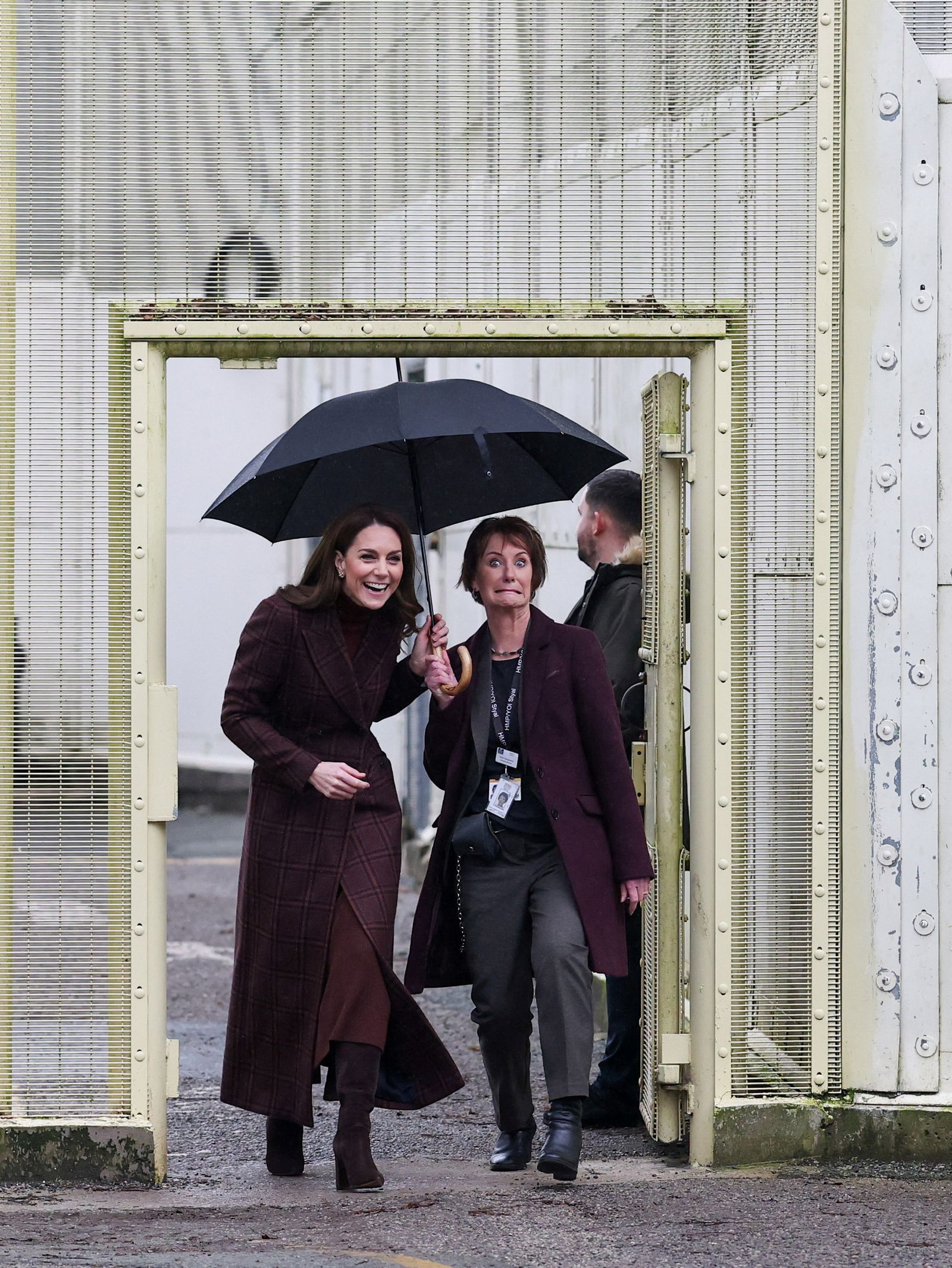 Image may contain Clothing Coat Blazer Jacket Adult Person Architecture Building Outdoors Shelter and Footwear