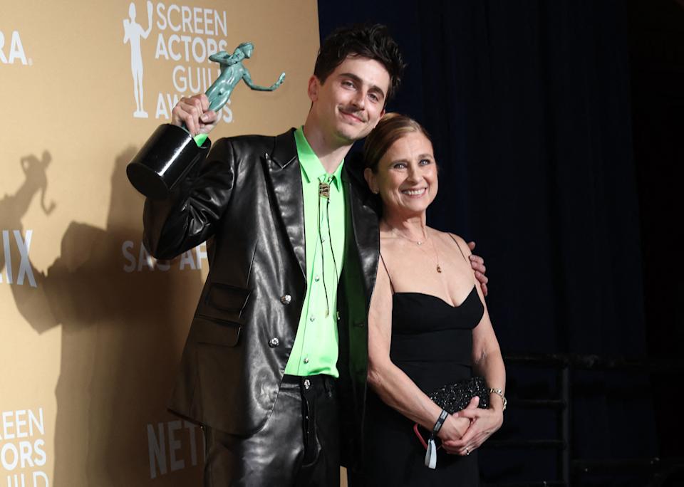 Timothee Chalamet poses with his mother Nicole Flender in the press room during the 31st Annual Screen Actors Guild awards