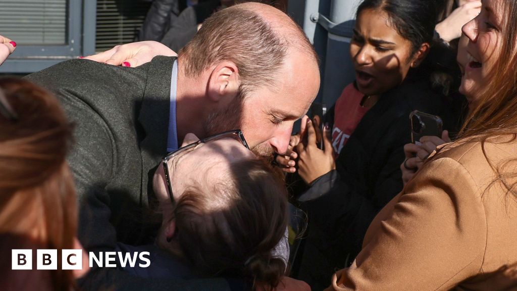 Prince William hugs student on visit to Poole college Prince William hugs student on visit to Poole college
