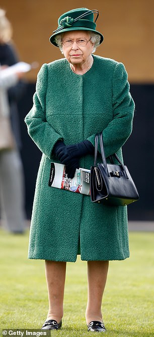 Queen Elizabeth II attends the Dubai Duty Free Spring Trials horse racing meet at Newbury Racecourse on April 13, 2019
