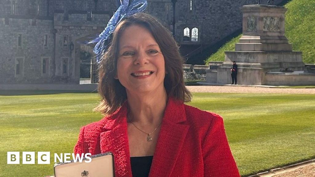 Keele University professor collects MBE from Windsor Castle Keele University professor collects MBE from Windsor Castle