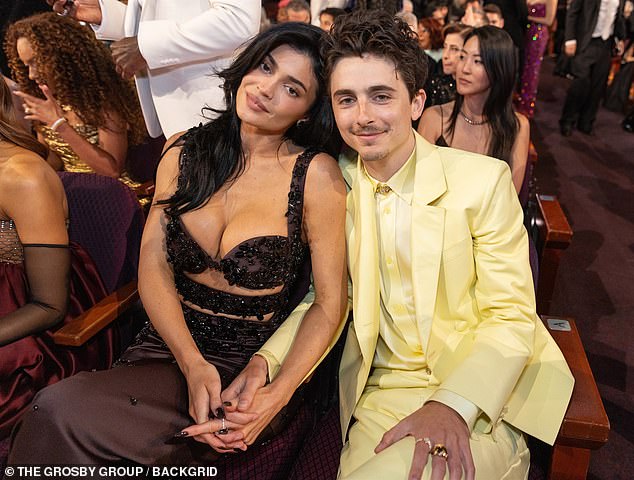 Kylie and Timothee pose from their seats at the 2025 Oscars