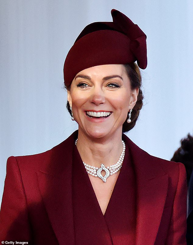 Kate stepped out for her first official state visit since announcing her cancer diagnosis to welcome the Emir of Qatar. Looking chic in a burgundy Alexander McQueen coat, the shoulders were sharply tailored to accentuate her waist in December 2024