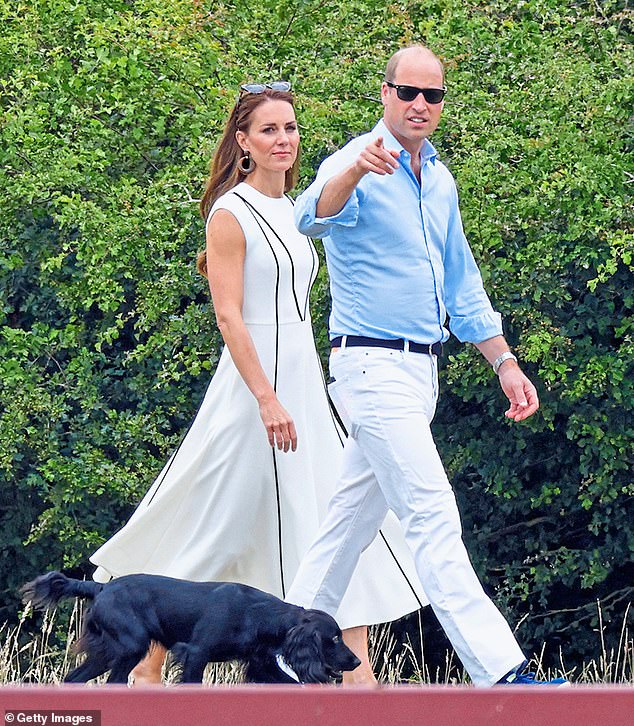Kate and William are pictured with their black Cocker Spaniel Orla in Windsor in 2022