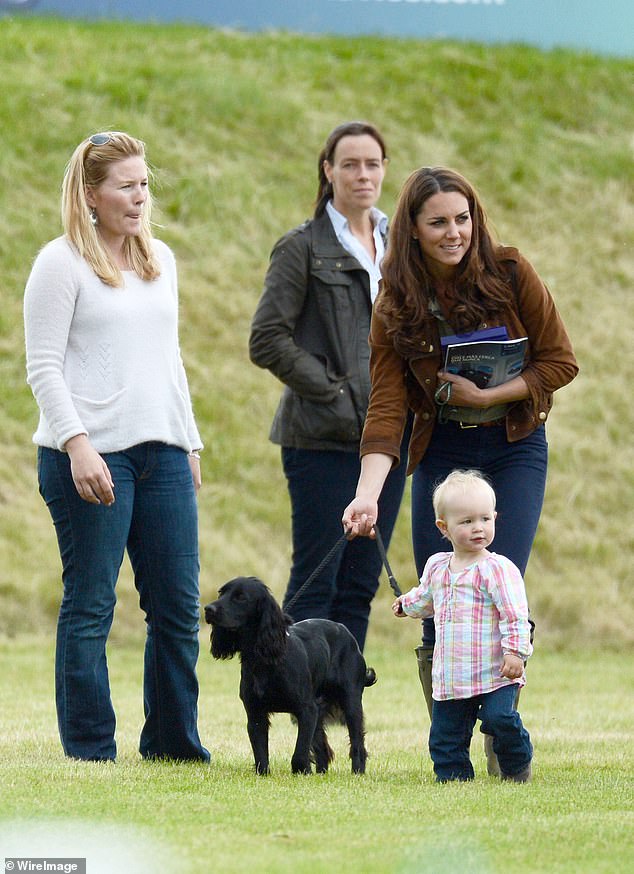 Kate was seen walking Lupo alongside Autumn Phillips and her daughter Savannah in 2012