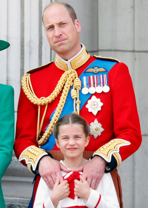 Prince William, Prince of Wales (Colonel of the Welsh Guards) and Princess Charlotte of Wales watch an RAF flypast from the balcony of Buckingham Palace during Trooping the Colour. Pic: Getty Images