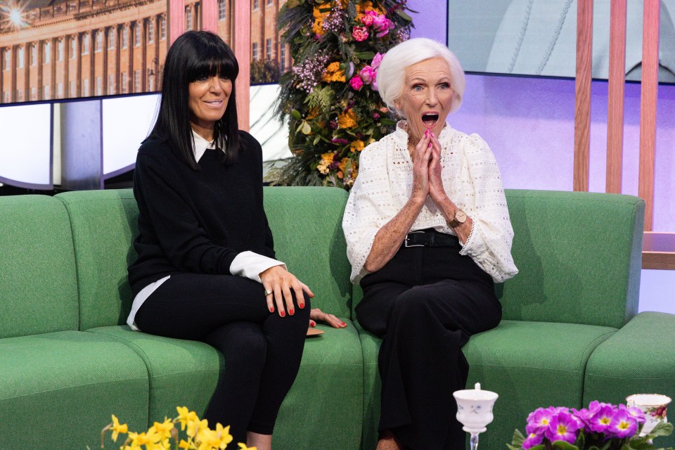 Claudia Winkleman and Dame Mary Berry on a green sofa.