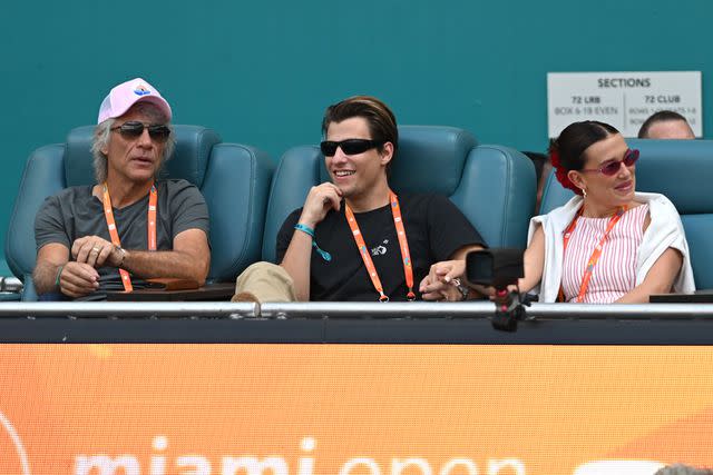 Michele Eve Sandberg/Shutterstock  Bon Jovi, Jake Bonjovi and Millie Bobby Brown.