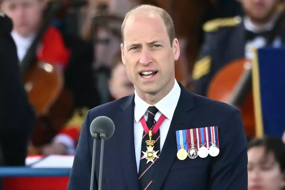 D-Day photo showing Prince William in the foreground speaking in his speech