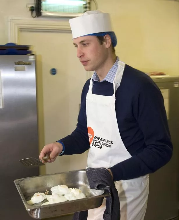  Hello! magazine undated handout photo of Prince William, serving a full English breakfast to the homeless at Christmas at CentrePoint's London kitchen