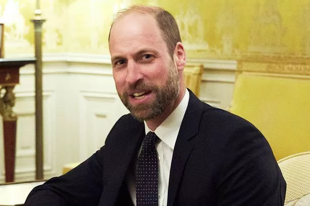 Prince William, Prince of Wales reacts during his meeting with  President-Elect Donald Trump (not pictured) at the Embassy of the United Kingdom's Residence on December 7, 2024 in Paris, France.