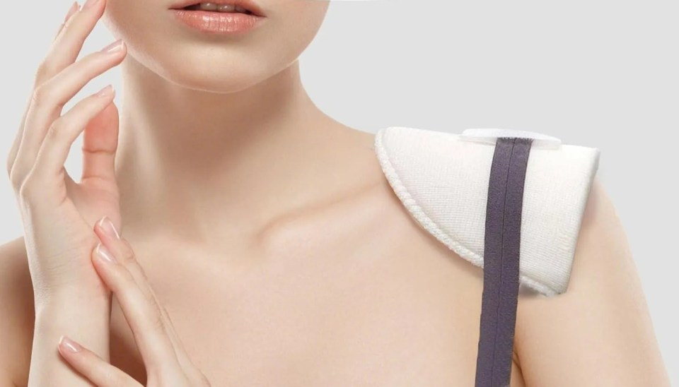 Shoulder pads worn with bra straps.