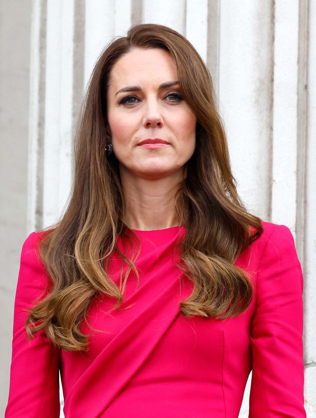 Catherine, Duchess of Cambridge stands on the balcony of Buckingham Palace