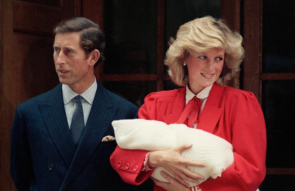 Prince Harry was born on 15 September 1984. He is pictured here with the late Princess Diana and the then Prince Charles as a baby. (AP1984)