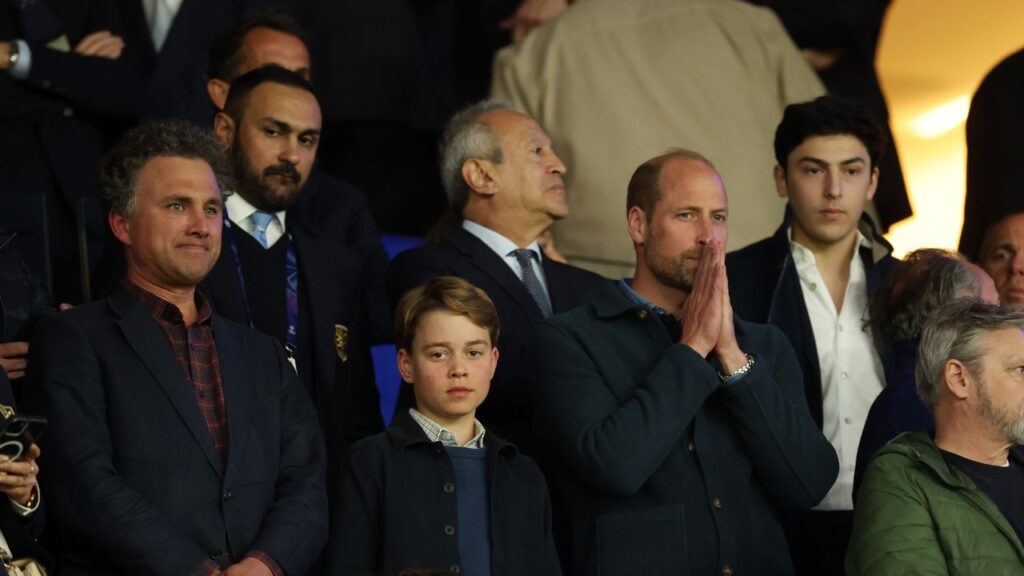 Prince George is the spitting image of Princess Diana’s father as he joins Prince William for a historic football match