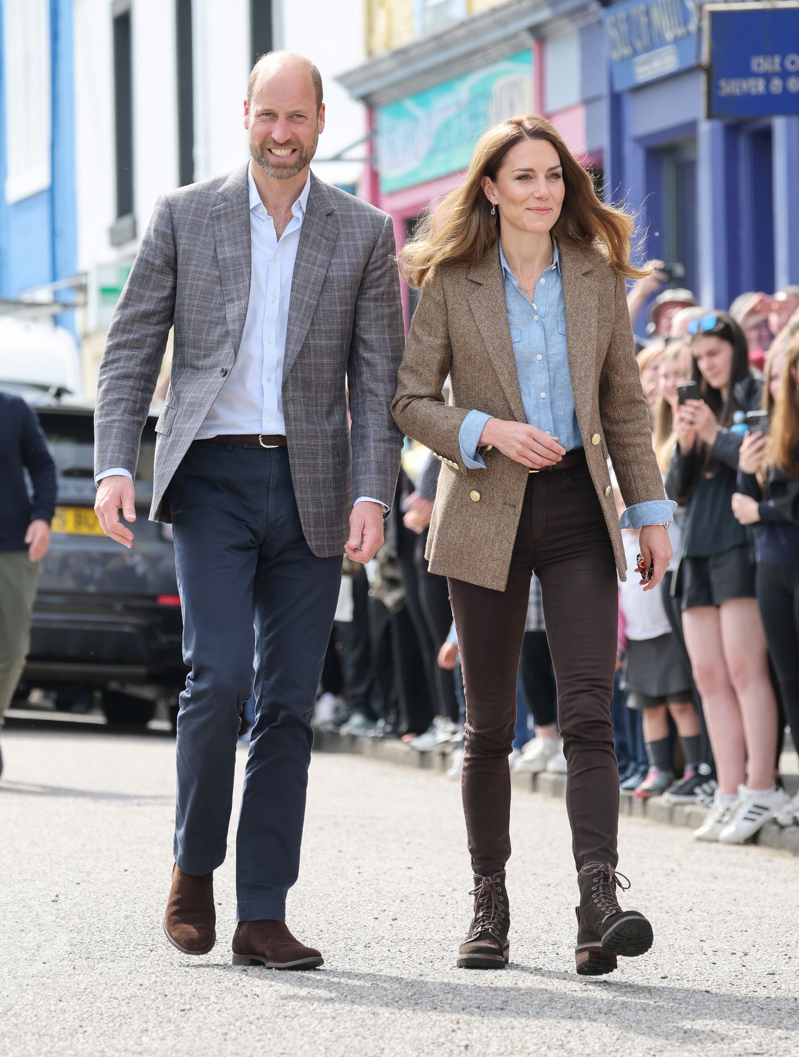 Image may contain Prince William Duke of Cambridge Pedestrian Person Blazer Clothing Coat Jacket Adult and Walking