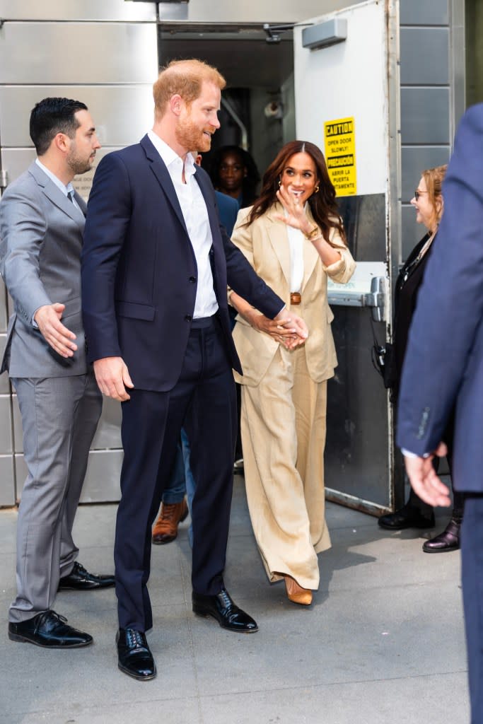 Meghan Markle waves to fans as she leaves the Time100 Summit at Jazz at Lincoln Center in Midtown on April 23, 2025 in New York City. GC Images