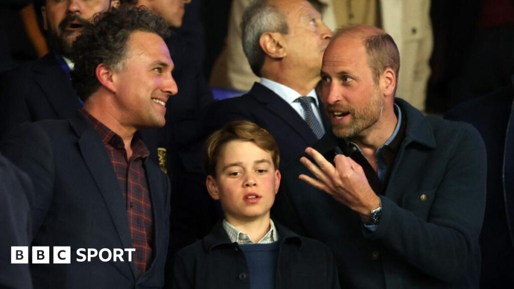 Thomas van Straubenzee, Prince George and the Prince of Wales interact in the stands during the Uefa Champions League 2024/25 Quarter Final First Leg match between Paris Saint-Germain and Aston Villa