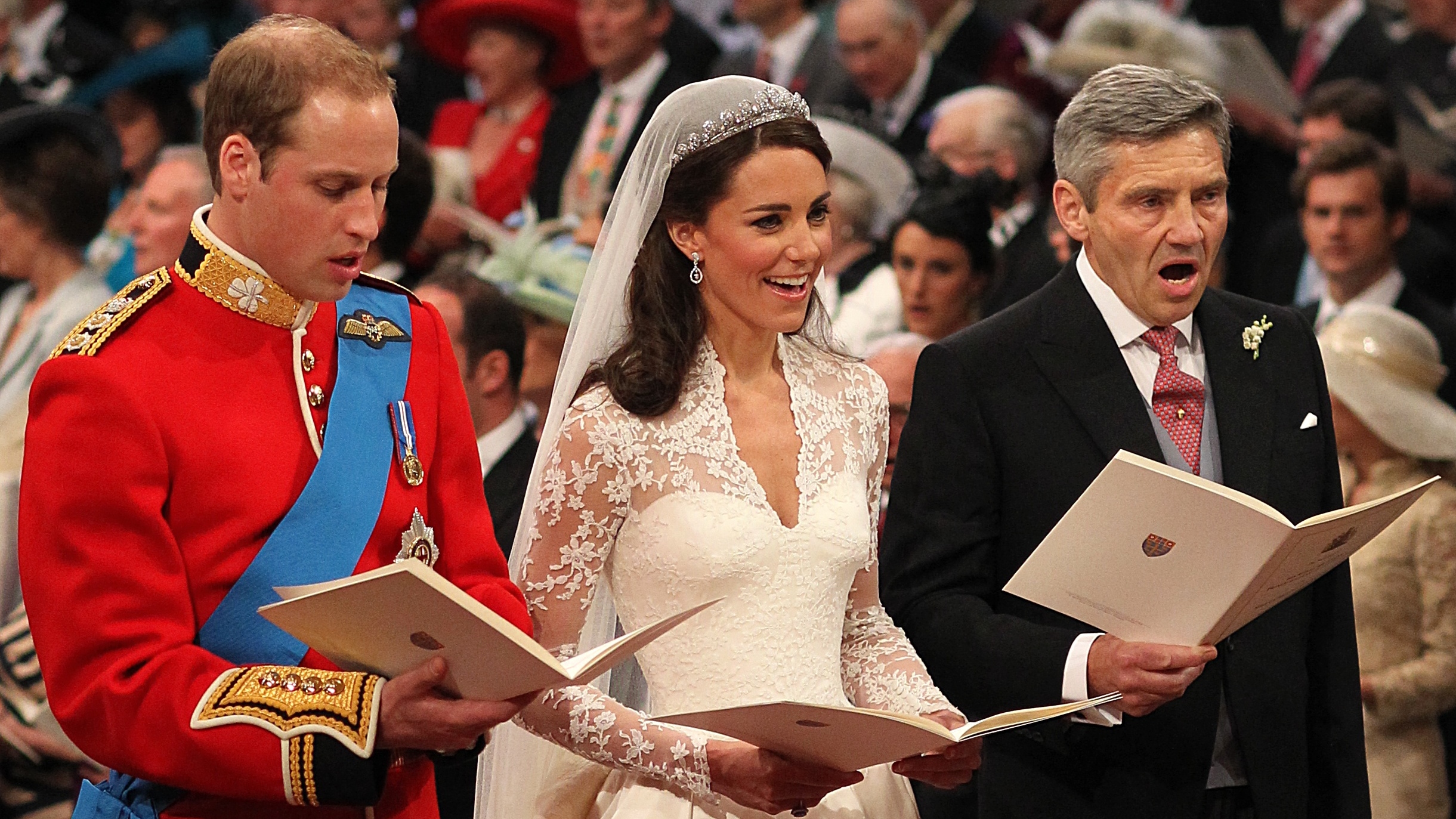 Prince William, Kate and Michael Middleton sing during the royal wedding at Westminster Abbey, on April 29, 2011