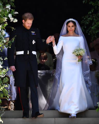 <p>WPA Pool / Pool / Getty Images</p> Prince Harry and Meghan Markle on their May 19, 2018 wedding day at St. George's Chapel at Windsor Castle