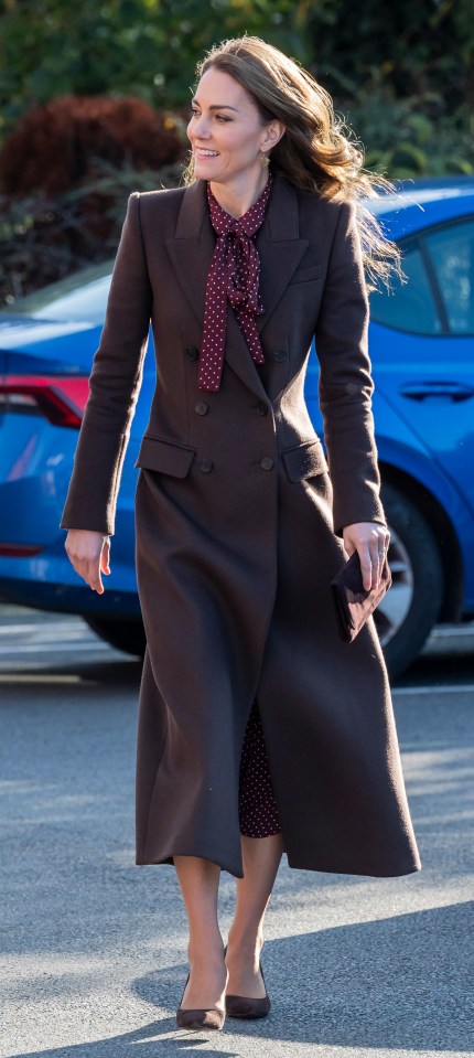 Catherine, Princess of Wales, speaking with emergency services personnel.