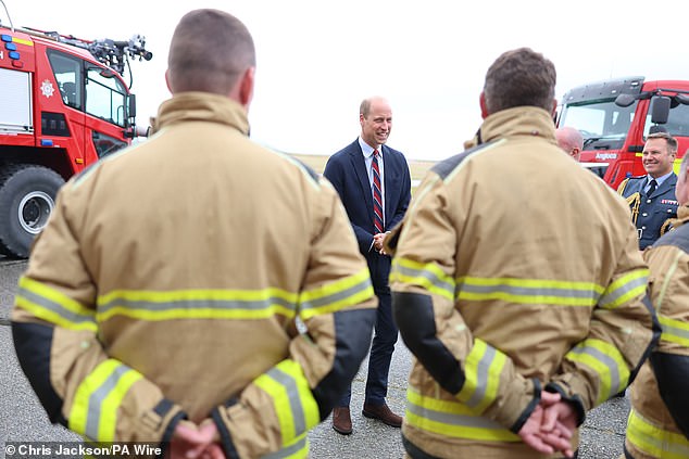 The Prince of Wales, Royal Honorary Air Commodore, RAF Valley, talks to base personnel inside the Air Traffic Control Tower
