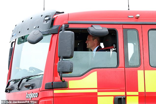 William looked to be having a great time from the passenger seat of the vehicle