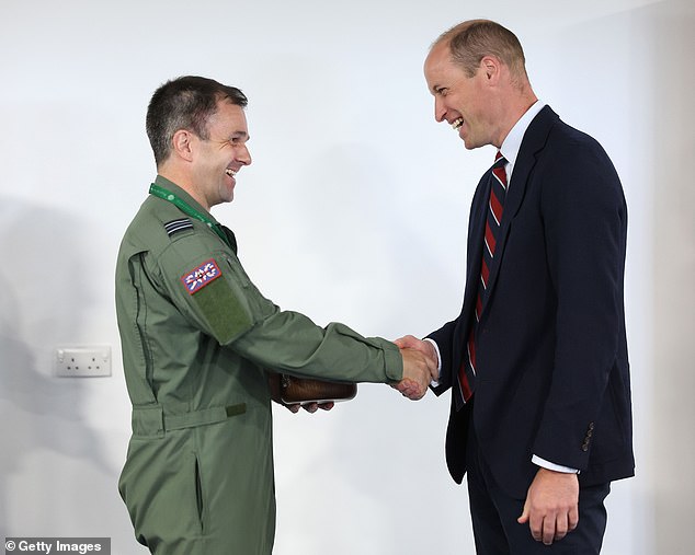 Prince of Wales presents the 'The Prince of Wales Award' to Flight Lieutenant Jake Flemingto