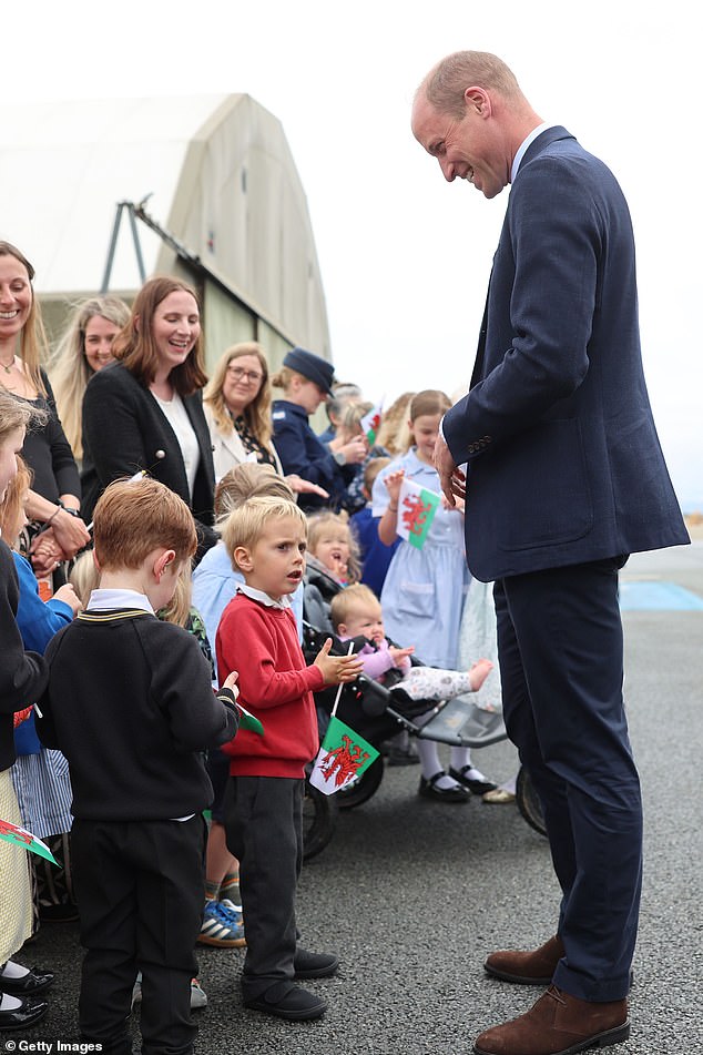 He spoke to schoolchildren, who had brought out their Welsh flags to greet him