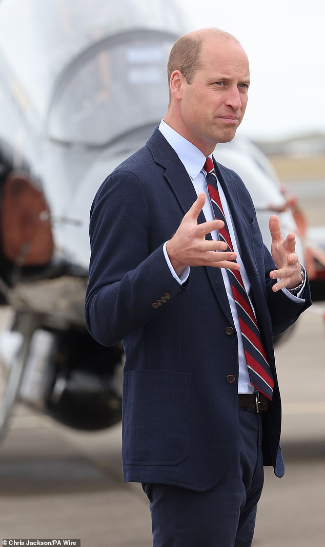 Prince William appeared in great spirits are he received a tour around the airbase in Anglesey