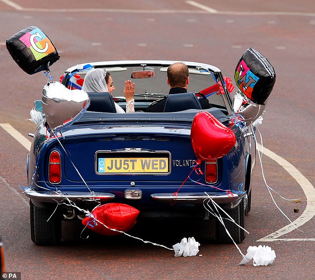 The car was decorated with L plates, bunting, ribbons and balloons