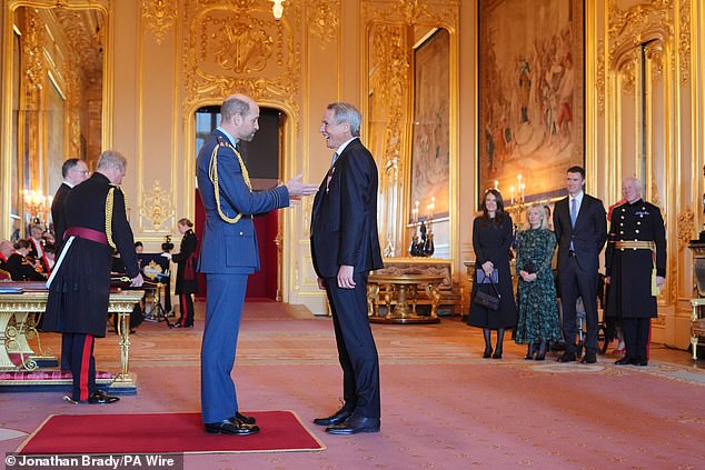Hansen looked in good health and even better spirits as he received the award from Prince William