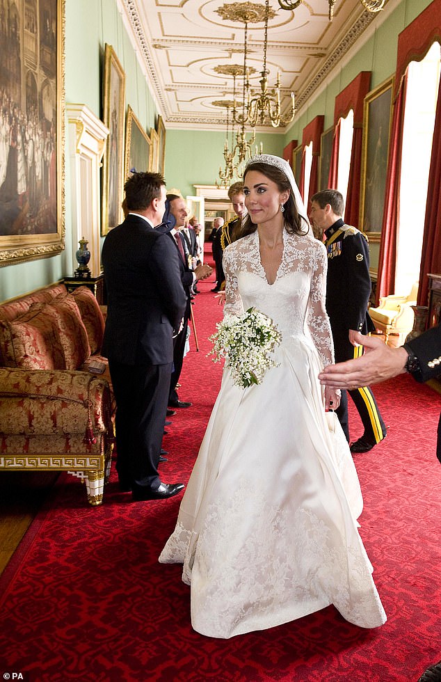 Kate Middleton, newly appointed as the Duchess of Cambridge, arrives to greet the 650 guests invited to the champagne reception