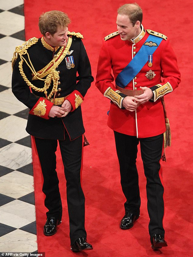 Prince Harry and Prince William wait for Kate to arrive at Westminster Abbey on April 29, 2011. 'Well, she looks beautiful, I can tell you that,' Harry whispered