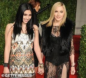 Lourdes holding her mother Madonna's hand on the red carpet