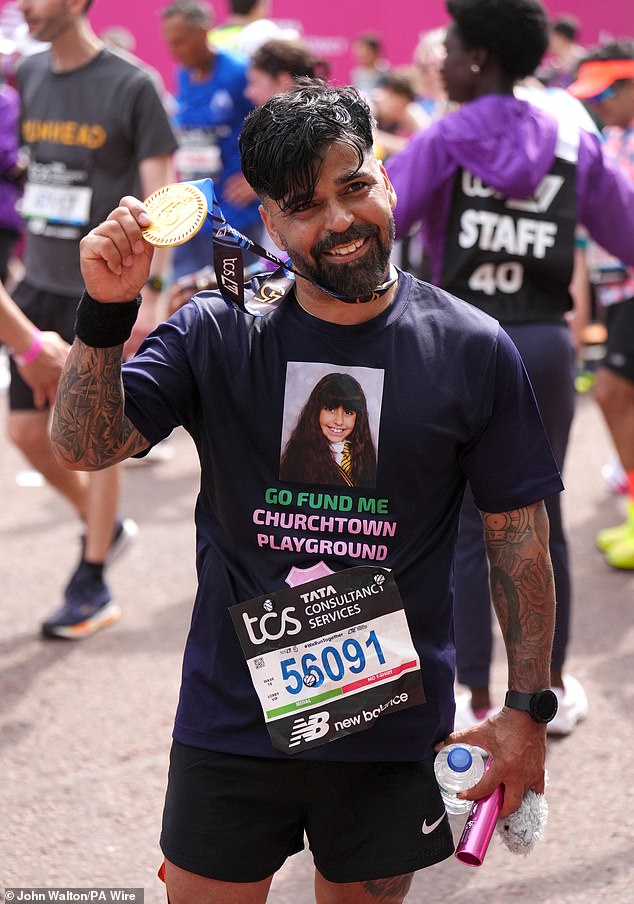 Sergio Aguiar, the father of Southport attack victim Alice, running for Churchtown Primary School after crossing the finish line during the TCS London Marathon on Sunday