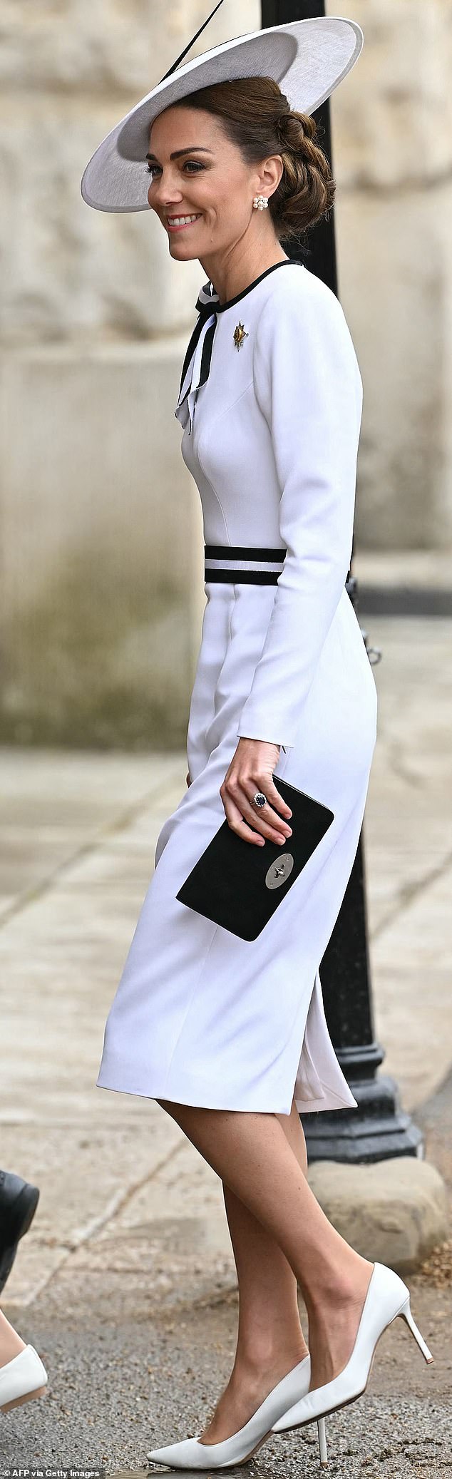 For her first official appearance after her diagnosis, she wore a monochrome Jenny Packham hat and dress at Trooping of the Colour last June