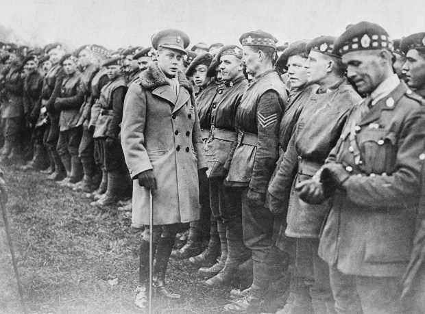 The Prince of Wales is seen with soldiers during World...
