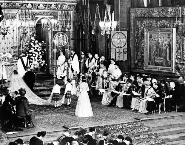 Britain’s Princess Elizabeth and the Duke of Edinburgh kneel before...