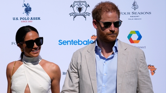 FILE - Britain's Prince Harry, right, and wife Meghan Markle, Duchess of Sussex, arrive for the 2024 Royal Salute Polo Challenge to Benefit Sentebale, on April 12, 2024, in Wellington, Fla. Prince Harry’s fight for police protection in the U.K. has received another setback. A judge on Monday, April 15, 2024 rejected his request to appeal an earlier ruling upholding a government panel’s decision to limit his access to publicly funded security after he quit as a working member of the royal family. (AP Photo/Rebecca Blackwell, File)(AP)