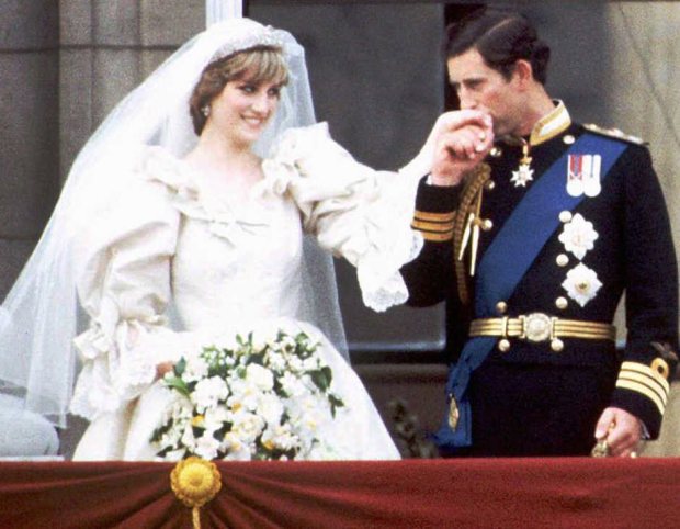 Prince Charles and Princess Diana on the balcony of Buckingham...