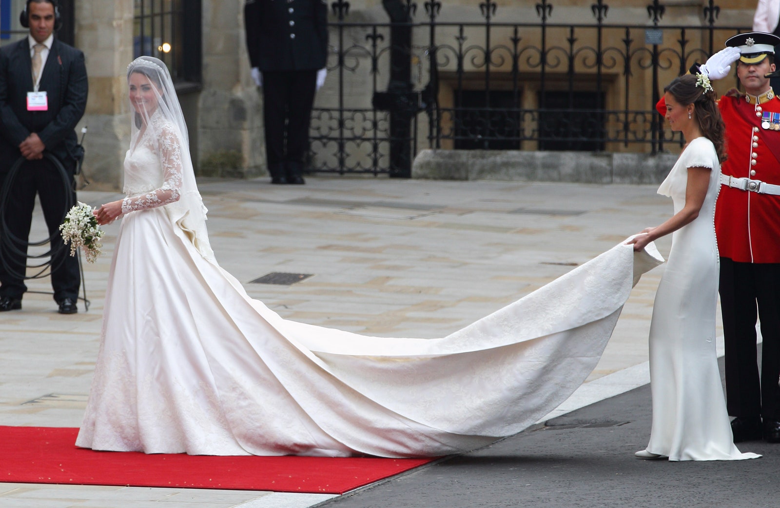 Image may contain Clothing Apparel Human Person Wedding Gown Wedding Robe Fashion Gown Female and Woman