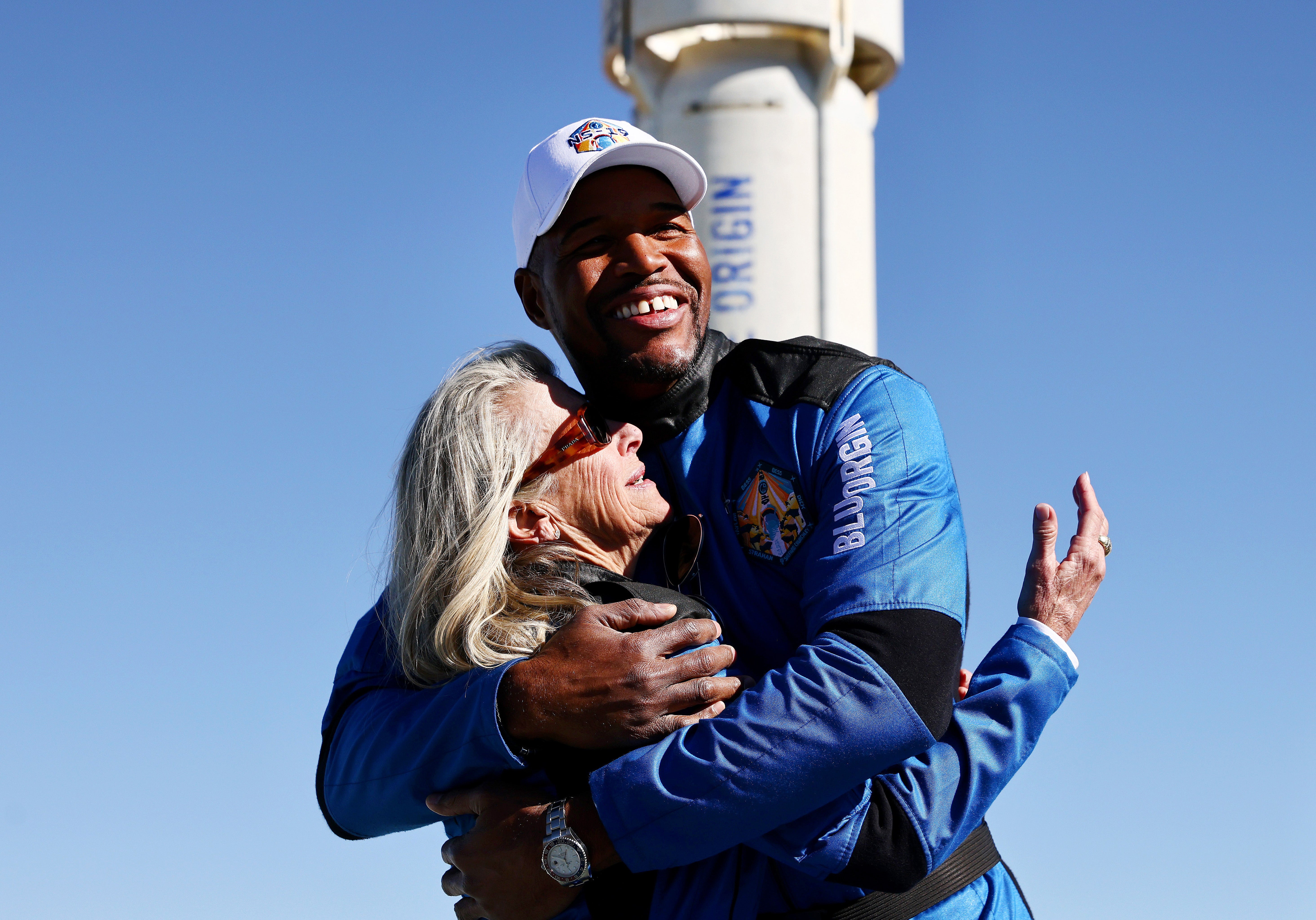 ‘Good Morning America’ host and former NFL star Michael Strahan embraces Laura Shepard Churchley, daughter of astronaut Alan Shepard. The pair flew in December 2021
