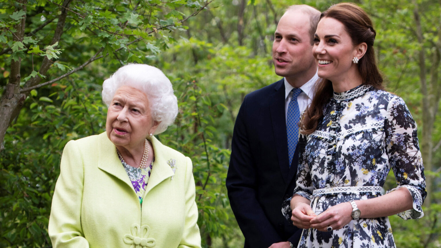 Former Royal Butler Says Prince William and Princess Kate’s “First Priority” Is “Very Different” Than Queen Elizabeth’s Was Kate Middleton, Queen Elizabeth and Prince William at the Chelsea Flower Show